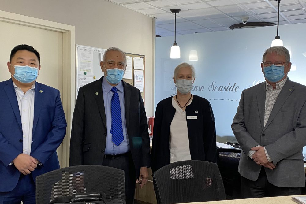 (l to r) John Yuan (GEM CFO), Syed Hussain (GEM CEO), Carol Rhynold (Canso Seaside Manor Administrator), James Balcom (GEM COO)